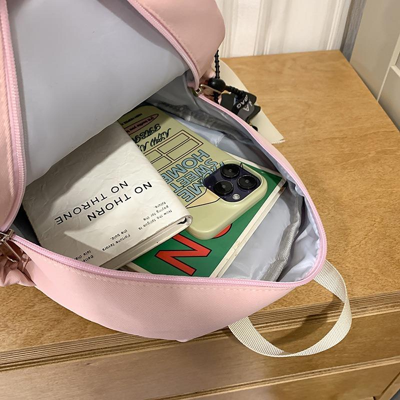 The new schoolbag is high-value, fresh, sweet and cute, red panda backpack, kindergarten level 1-3 large-capacity backpack.