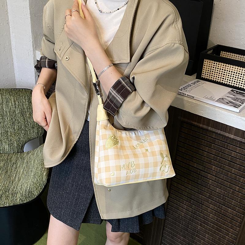 High-value niche bag women's autumn 2025 new fashion messenger bag Korean version of foreign-style commuter portable dumpling bag