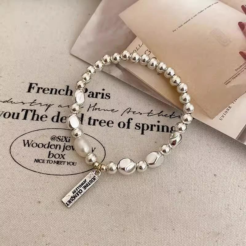 Exquisite Irregular Pearl Bracelet: Light Luxury Elastic Rope Design for Women