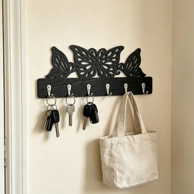 Kleiderhaken mit 6 Metallhaken Wandmontage Nagelfreie Haken Schmetterling Hohl Design Aufbewahrungsregal für Schlüssel Taschen Kleine Gegenstände