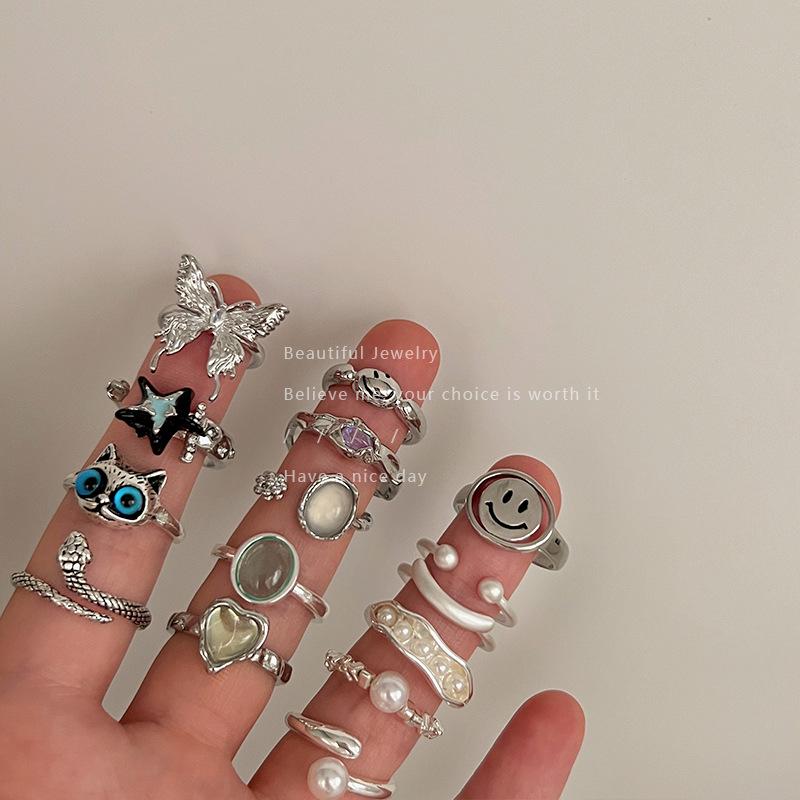 Fargeblokk Kattesøye Stjerne Ring: Trendy dame åpen statement-ring
