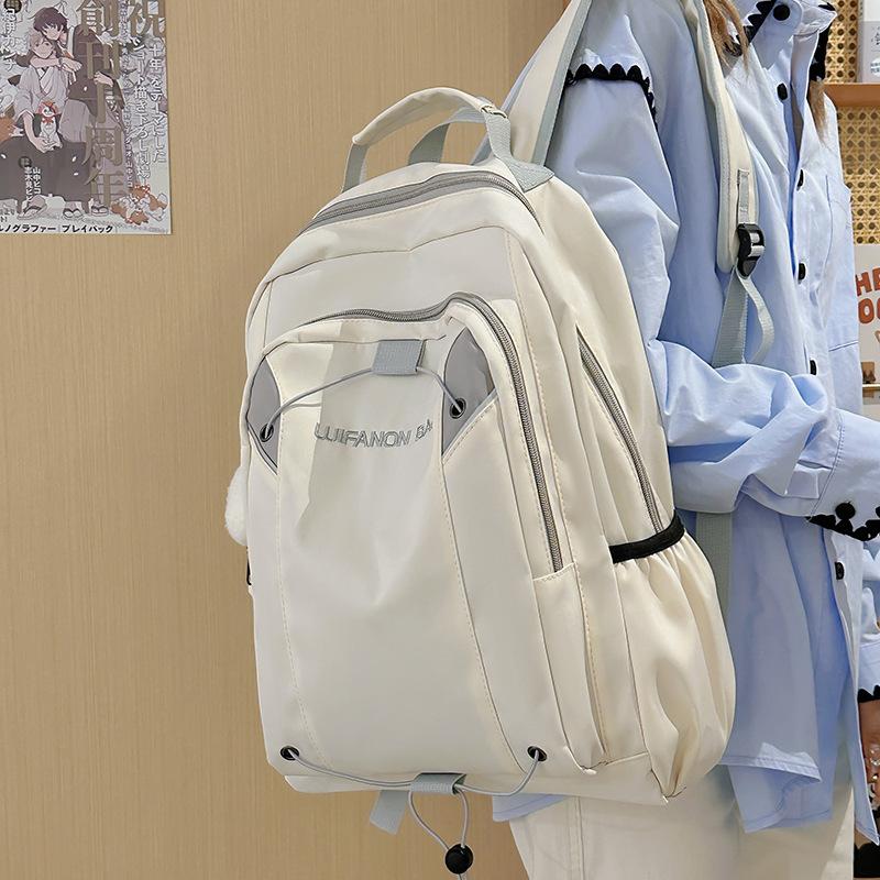 Simple and fashionable student backpack New casual outdoor sports backpack Middle school student large-capacity college style schoolbag