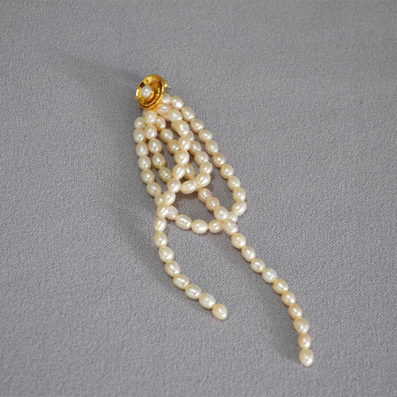 

Французькі ретро прісноводні рисові перлинні квіти з бахромою, звивисті повітряні феї, що майорять, довгі сережки виглядають тонкими