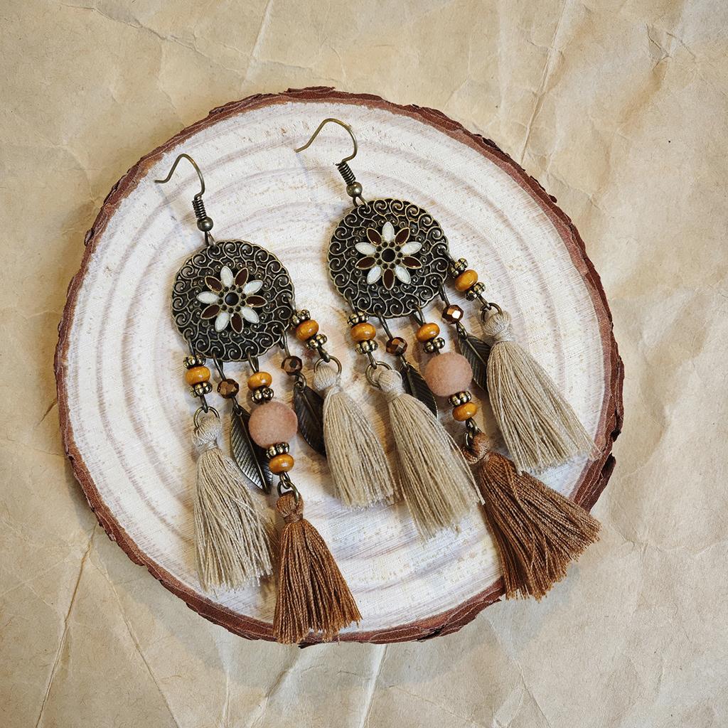 Retro ethnic style woven feathers long fringed earrings, bohemian high-end hollow rice bead earrings