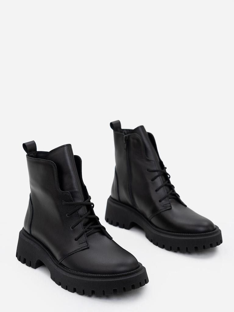 Black Leather Boots On ISSA Plus Bike