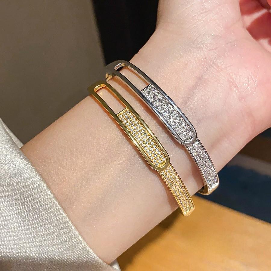 Geometrisches Goldplattiertes Zirkonium Ovales Manschettenarmband Für Modebewusste Frauen