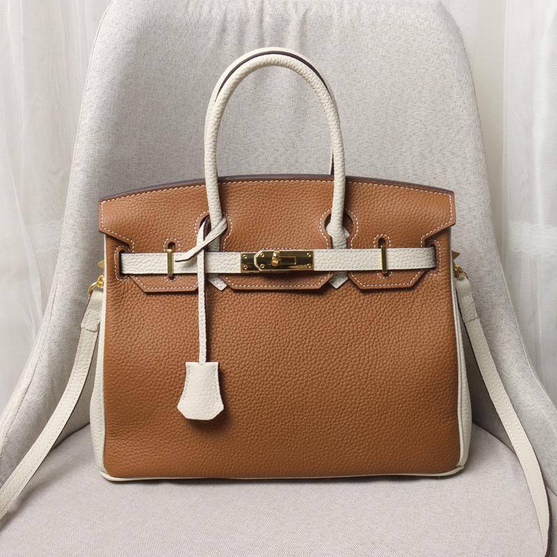 2021 Spring new trendy leather handbag top layer cowhide capacity one-shoulder crossbody hand-carried platinum bag