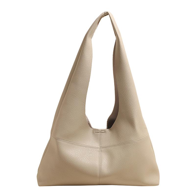 

This year, simple and solid color soft leather underarm tote bags are popular, versatile commuting and leisure large-capacity shoulder mother and chil зелёный