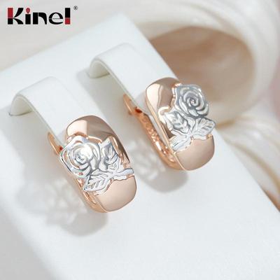 Kinel-Ohrringe aus Roségold mit silberfarbener Blume