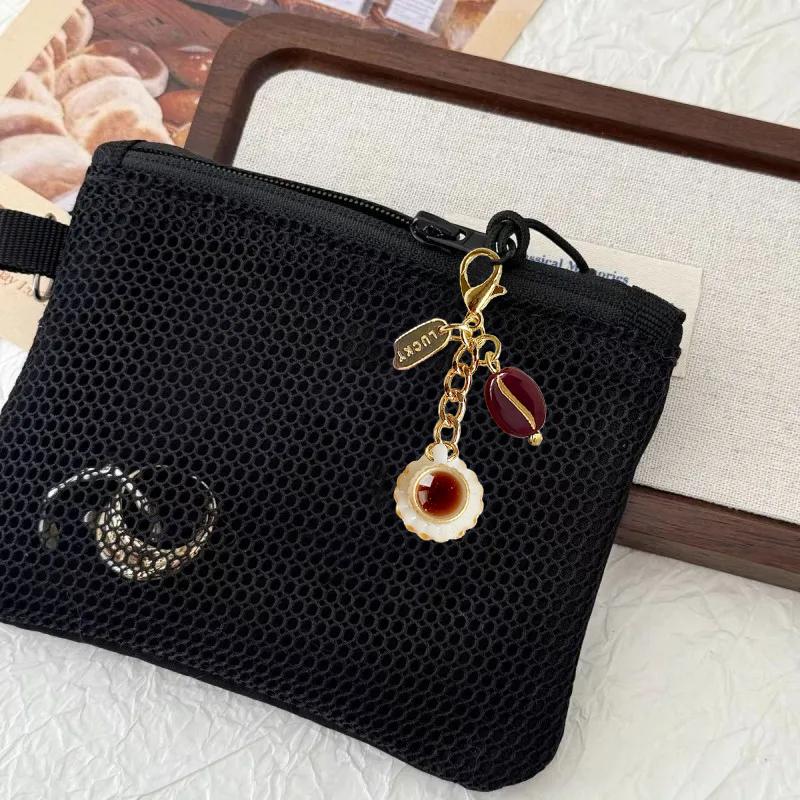 Ladies' bag pendant keychain brown earbud cover with zipper creative and cute coin wallet pendant