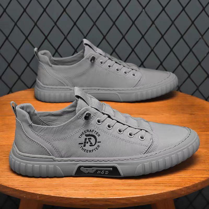 

Autumn popular canvas shoes breathable ice silk men s shoes trendy low-top casual shoes versatile sports white shoes 44 сірий колір