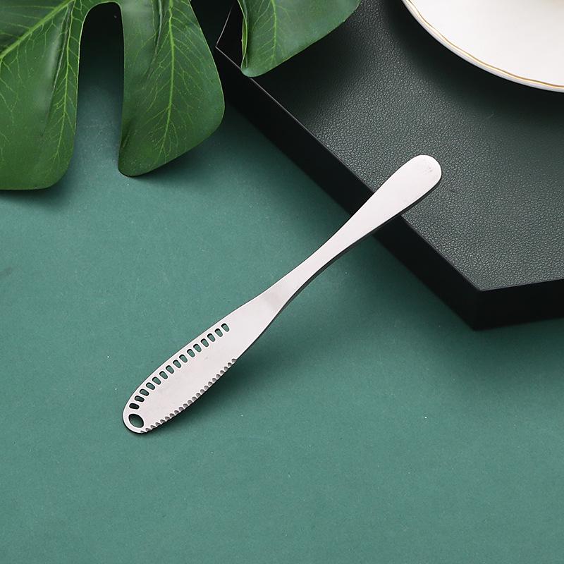 

Stainless Steel Butter & Cheese Knife with Holes - Multipurpose Bread, Jam, Baking, and Cream Scraper