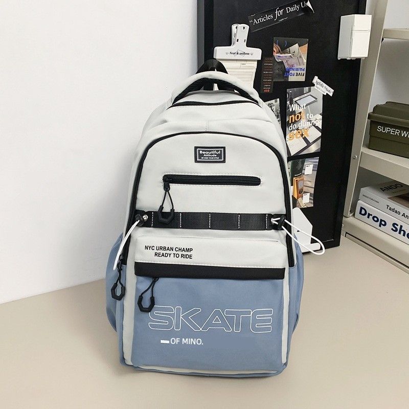 

Американский уличный рюкзак для ученика средней школы, мужской, модный, большой вместимости, для ученика старшей школы, мужской, новинка 2025 года, для ученика средней школы Blue with black