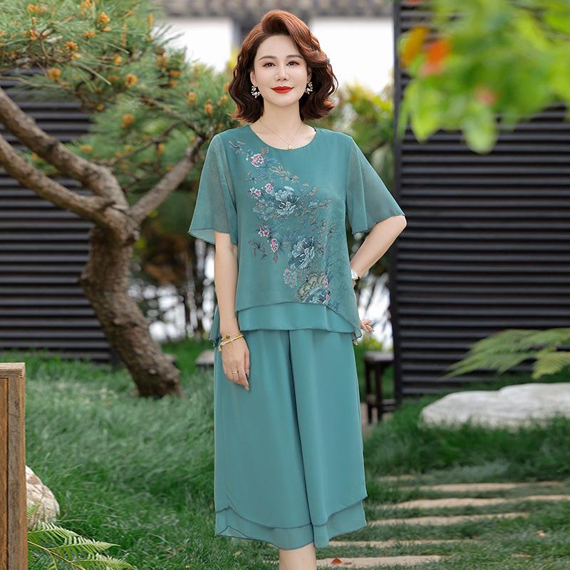 

2026 Stylish Summer Two-Piece Set for Grandma - Short-Sleeved Top & Casual Pants 4XL (suggested 135-150 jin) синій