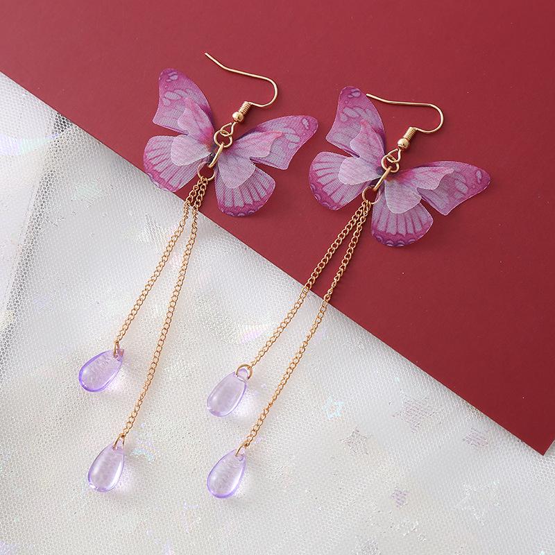 Purple Tassel Butterfly Pearl Earrings: Bold and Elegant Design