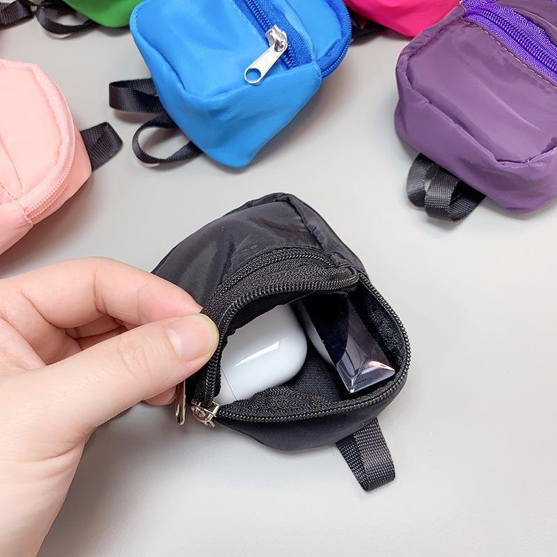 Double-layered small schoolbags, coin purses, phone cases, backpacks, pendants, and earphone covers are all universal