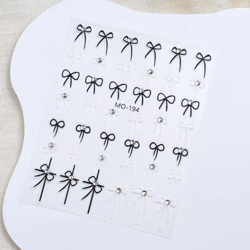 

Xiaohongshu Самые продаваемые наклейки для ногтей с цветной глазурью в виде бабочек, розовые ракушки, яркие разноцветные бабочки, ношение, украшение для ногтей, наклейка для ногтей MO-194 [Crystal Diamond Bows Paste]]