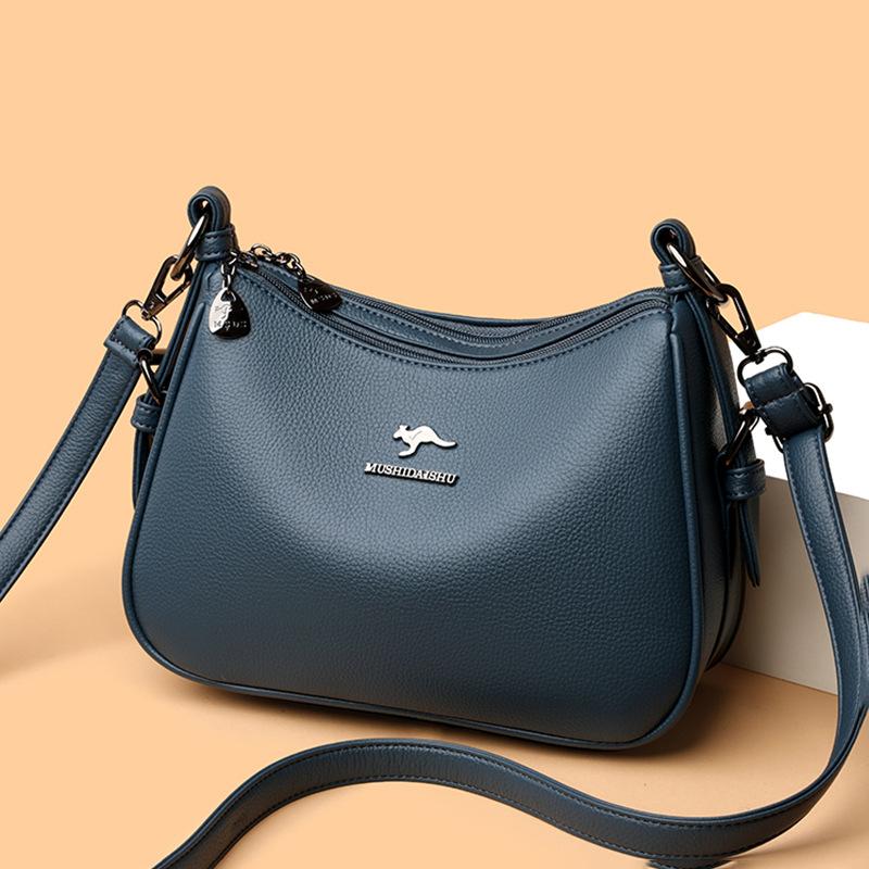 

2025 новая женственность элегантная простая классическая мягкая кожаная текстура большая вместимость для поездок на работу универсальная повседневная наплечная сумка