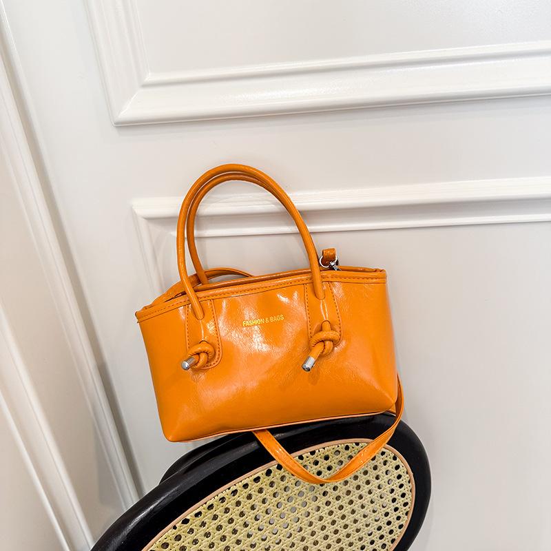 New retro niche design portable bucket bag temperament personality simple casual messenger bag bag women