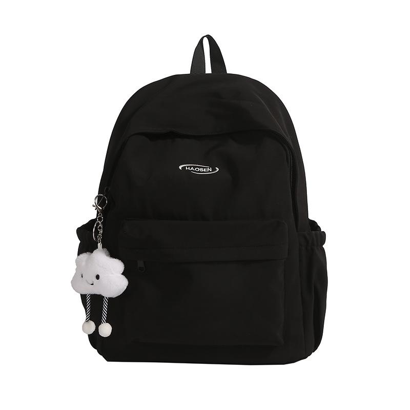 A Simple and Fashionable Backpack with A Large Capacity and A High-quality Texture. It Is A School Bag for Senior High School Students