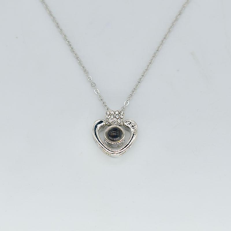 Peach Heart Series Titanium Steel Necklace: Elegant & Simple Gift for Women, Light Luxury Fashion.