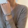 Unisex Leather Buckle Bracelet: European & American Inspired Horseshoe Design with Adjustable Watch-Style Strap