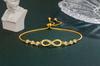 Gold Infinity Bracelet with Chains and Crystals for a Gift