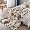 A Cozy Fleece Blanket Featuring a Book Theme Design with Soft Bedding, Perfect for Decorating a Modern Reading Nook Year-Round