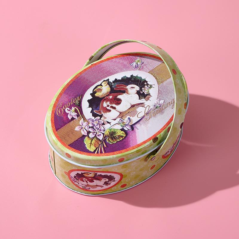 Oval Whimsical Easter Handheld Iron Box With Cheerful Rabbit And Egg Pattern Ideal For Childrens Gifts