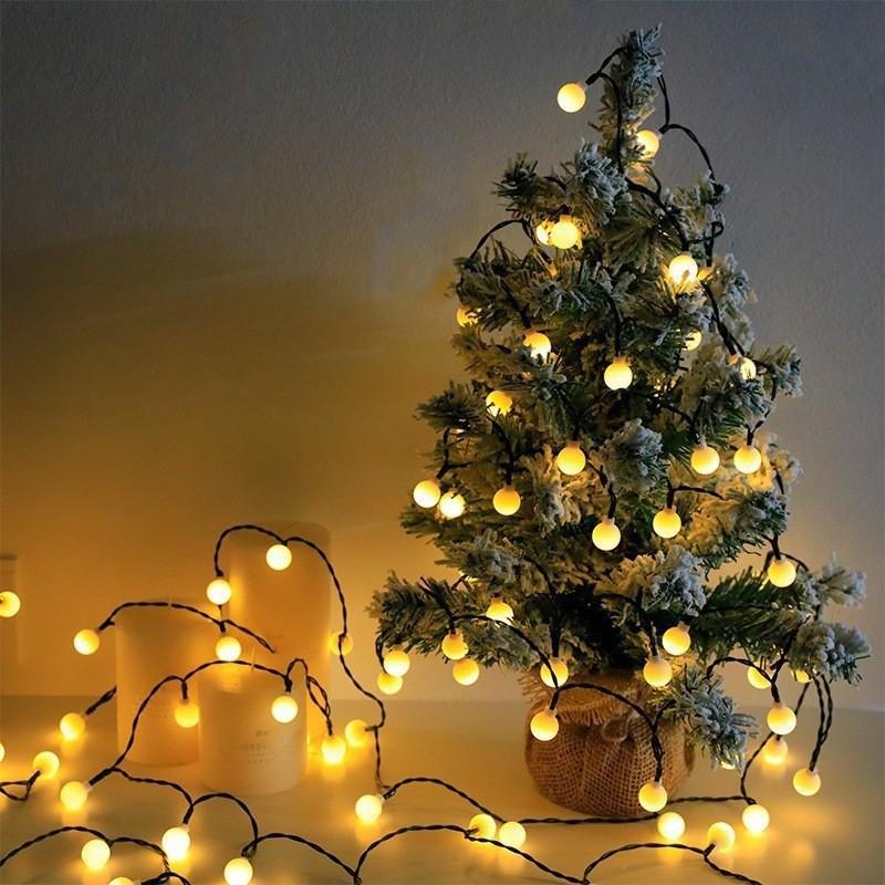 Outdoor Waterproof Solar LED Frosted White Ball String Lights for Camping and Festival Decorations.