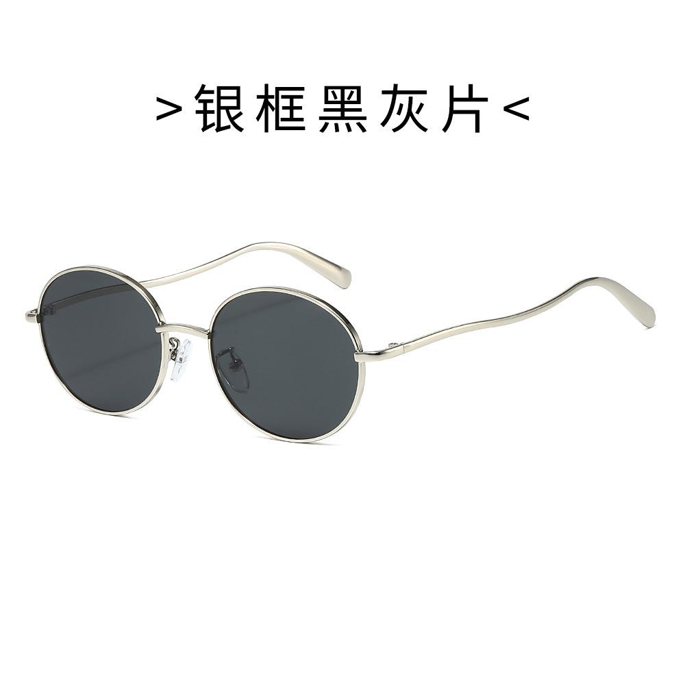 26 Metal-framed sunglasses, suitable for both men and women, offering UV protection