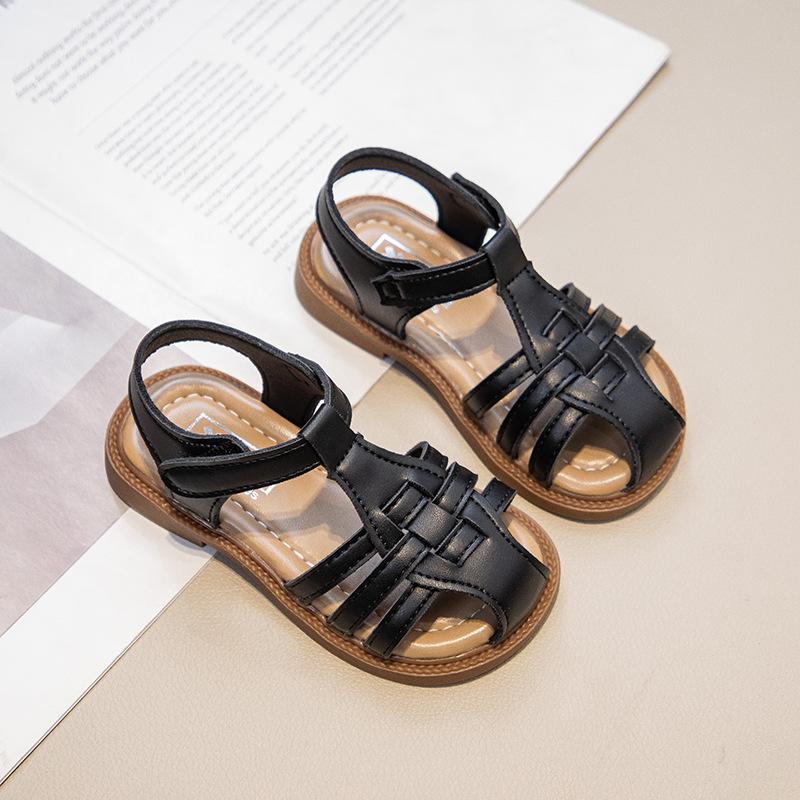 Flickors flätade sandaler 2025 sommar nya babyflickors romerska sandaler mjukbottnade prinsesskor barns strandskor trend