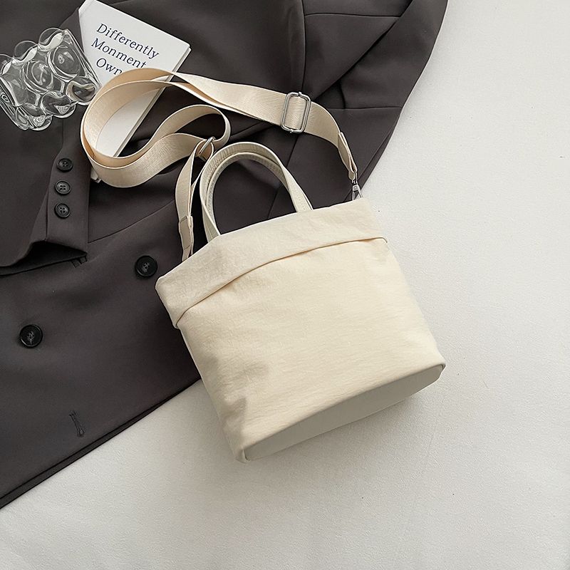 

Korean Style Casual Canvas Small Bag Female 2025 New Arrival Lightweight for Summer Crossbody Bag Artsy Niche Style Satchel Bucket Bag White without pendant