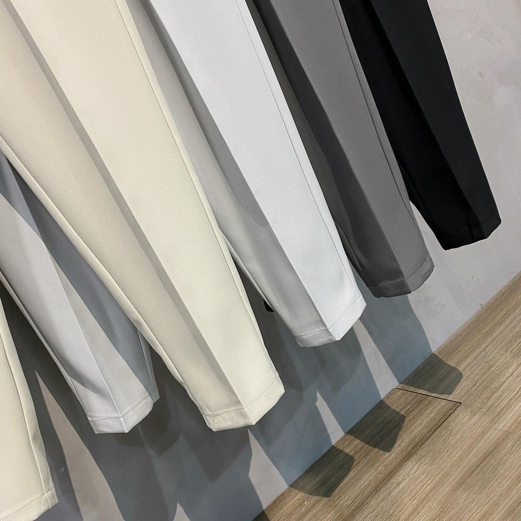 Wiosenne letnie męskie spodnie garniturowe Slim Fit Work Elastyczny pas Jogging Spodnie biznesowe Męskie czarne Plus Size