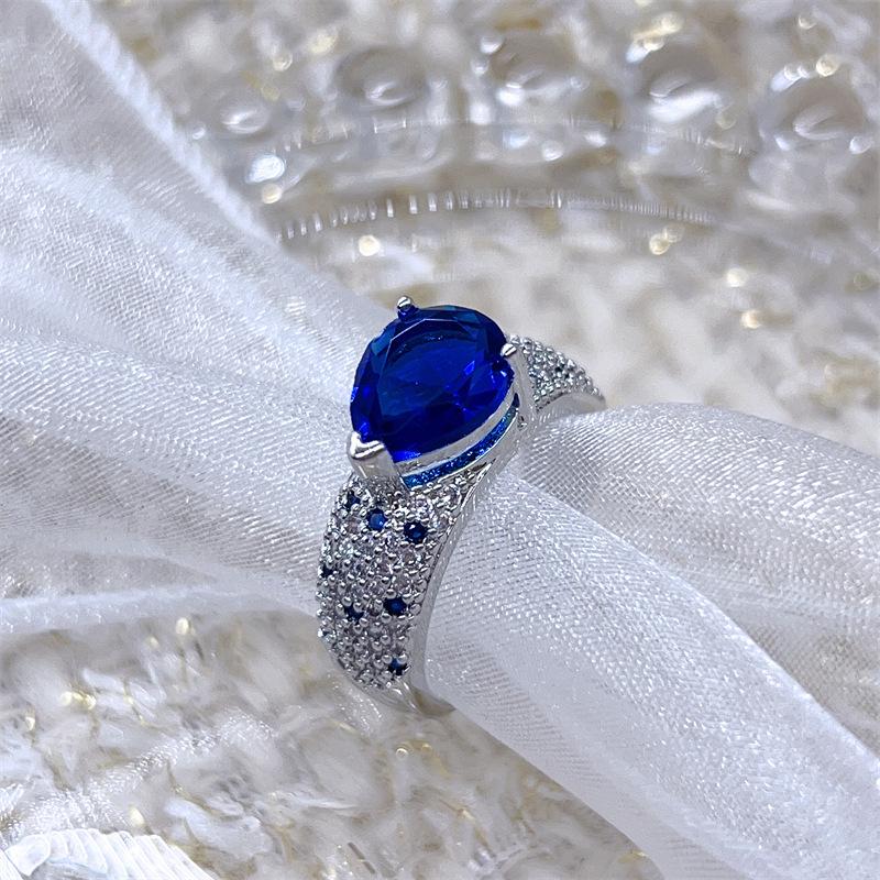 Elegant Adjustable Sapphire-Colored Gemstone Ring for Women with Micro-Paved Zircon Diamonds - Versatile and Stylish Gift.