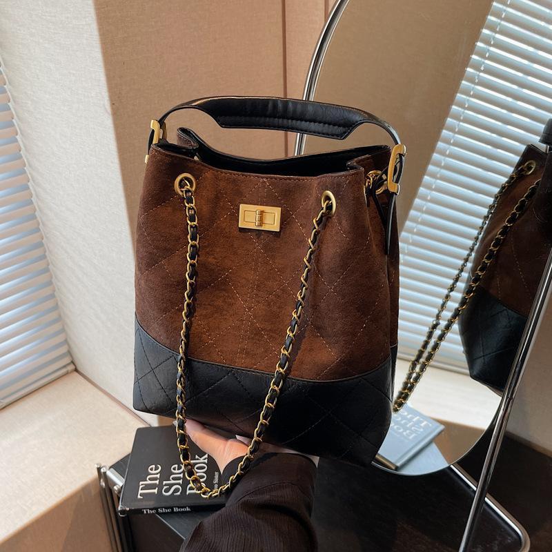 

Premium sense of work commuter bag women s bag 2025 new diamond chain bucket bag retro contrasting color shoulder messenger bag