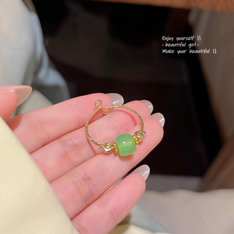 

2024 взрывов новое китайское имитационное кольцо из халцедона, открывающееся при холодном ветре, регулируемое кольцо на указательном пальце.