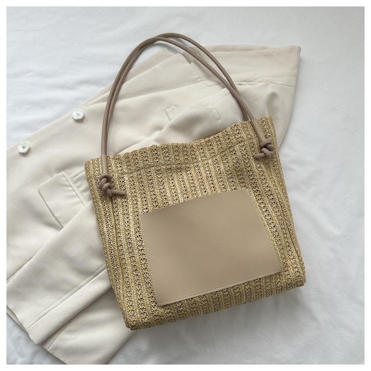 Summer straw bag women's 2025 new large-capacity woven shoulder bag high-end texture niche commuter tote bag