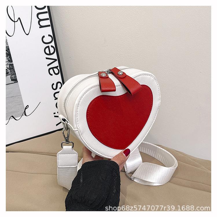 Women's bag 2025 new trendy fashion messenger bag simple foreign fashion popular women's bag shoulder bag cute peach heart small bag