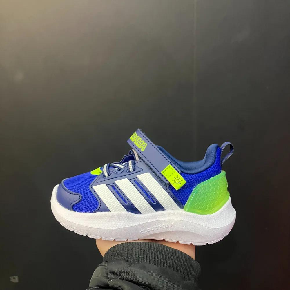 adidas ADIDAS Light ORAMA RNR EL I JQ4161 464466 BLUE 130