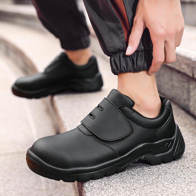 Herrenmode Stahlkappen Arbeitssicherheitsschuhe Weiches Leder Sicherheitsstiefel Schwarz Weiß Arbeiter Sichere Sneaker Schutzschuhe