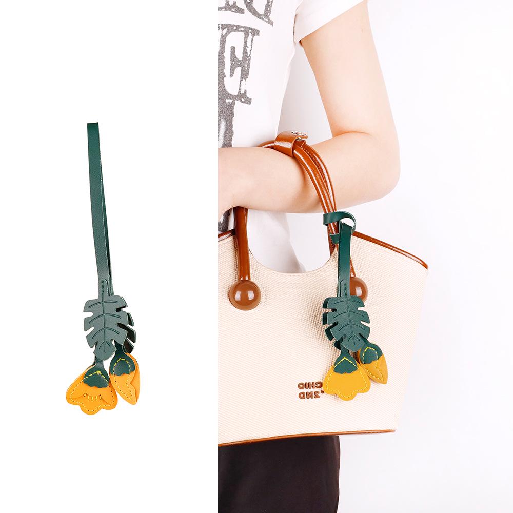 

Кожаный кулон в виде цветка бегонии из серии Miu: Автомобильные, Мобильные и Одежные Аксессуары