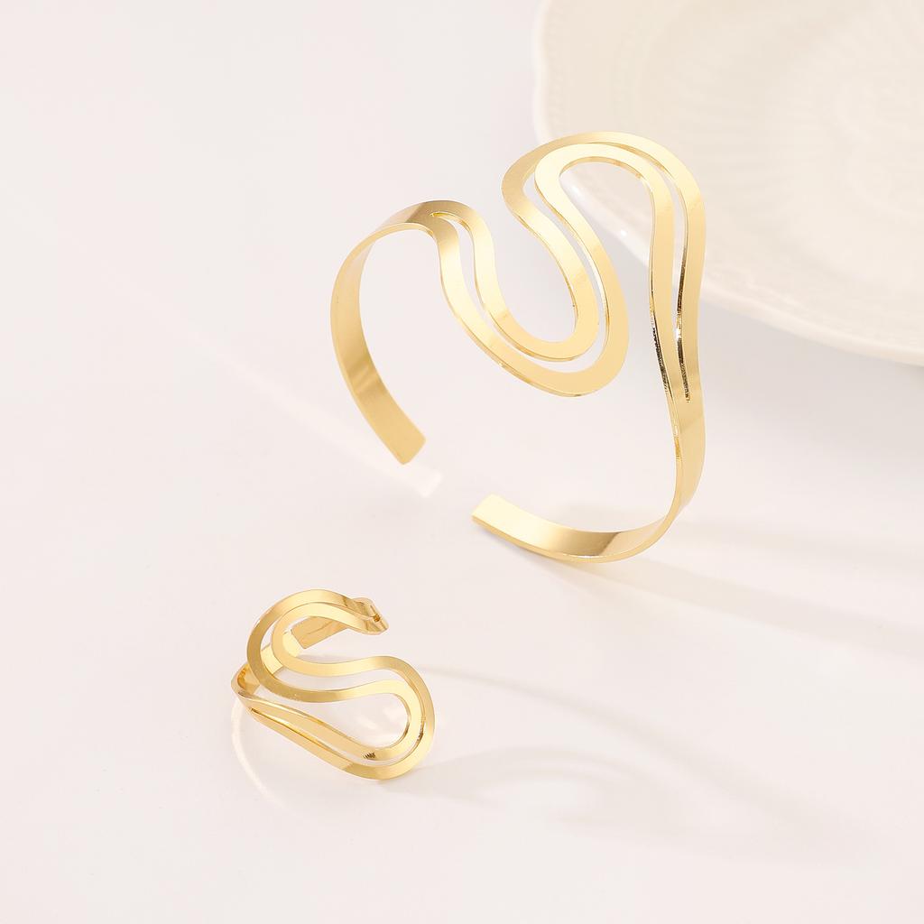 High-quality 2026 gold double-layer S-shaped hollow-out modeling bracelet, simple and versatile snake-shaped opening adjustable jewelry.