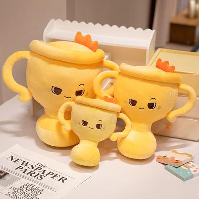 Kreativer Spaß Trophäenkissen Plüschtier Puppe Siegestrophäe Puppe Schul-Firmen-Auszeichnung Stoffpuppe