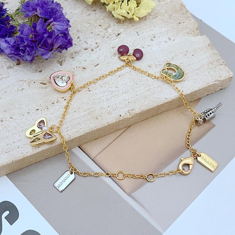 

Шикарный многошармовый браслет-ожерелье с динозавром и вишневым сердцем