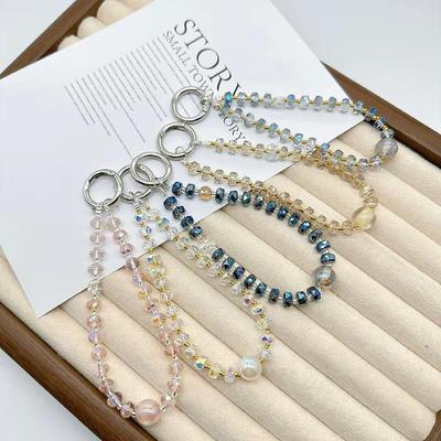 Lanière de téléphone et pendentif porte-clés élégants en perles de cristal