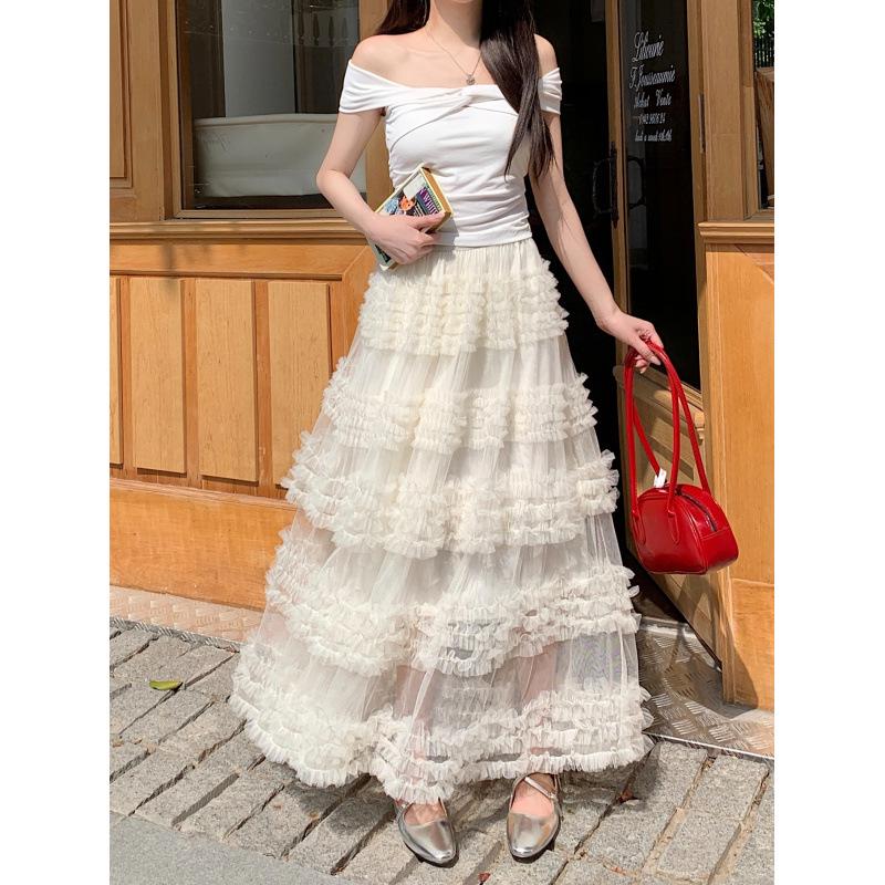 

Женская двухслойная юбка-трапеция из кружевной сетки с деревянными ушками L бежевый