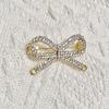 Women Brooch Bowknot Shape Anti-Rust Finish Shawl Clip with Faux Pearl Rhinestones Inlaid Sweaters Scarves Jackets Decorative Anti-exposure Pin