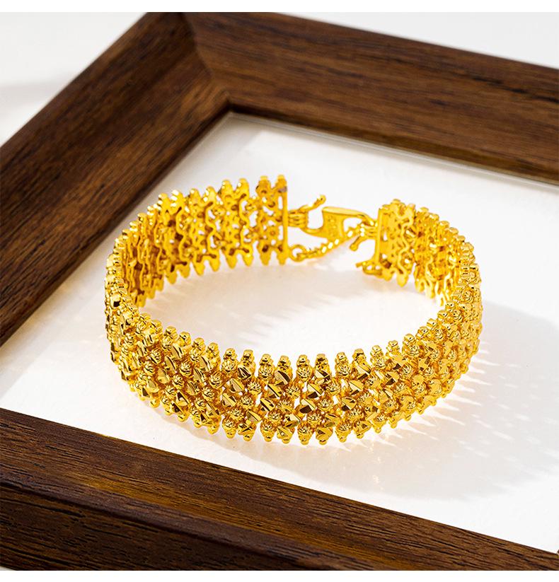 Vietnamesisches Gold Durchbrochenes Disco-Perlenarmband – Nicht verblassender, Trendiger Damenschmuck im Antiken Imitationsgold-Design