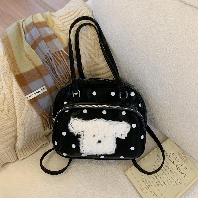 

Korean version of cute polka dot shoulder bag women s 2025 new fashion cartoon puppy backpack large-capacity commuter bag